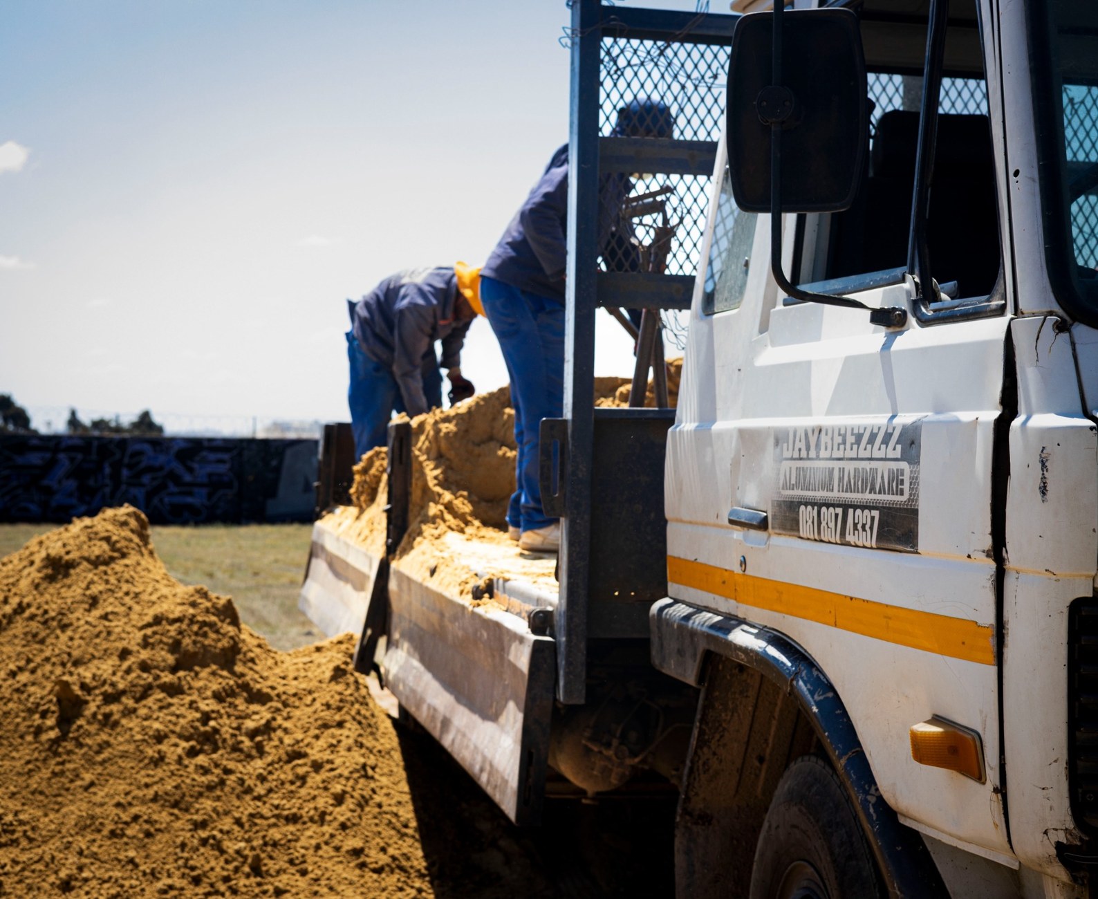 Jaybeezz Trading and Projects team delivering building material on site